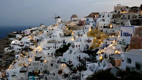 Night-hyper-lapse-of-Oia-town,-Santorini-island,-Greece