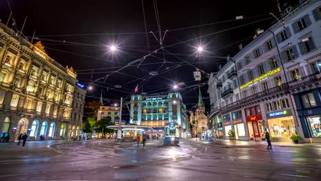 Zurich-Switzerland-time-lapse-4K,-night-city-skyline-timelapse-and-tram-at-Paradeplatz