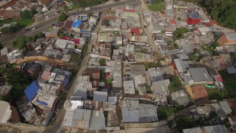 Aerial-circling-around-a-shanty-town-in-downtown-Bogota,-Colombia