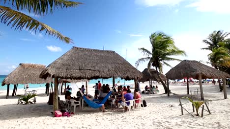 MEXICO,-CANCUN---16-NOVEMBER-2014:-Big-mexican-family-celebrate-a-birthday-on-beach