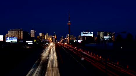 Timelapse-view-of-night-traffic-pouring-out-of-the-city