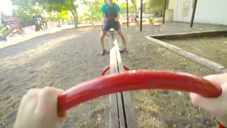 POV-footage-of-three-kids-playing-in-a-playground