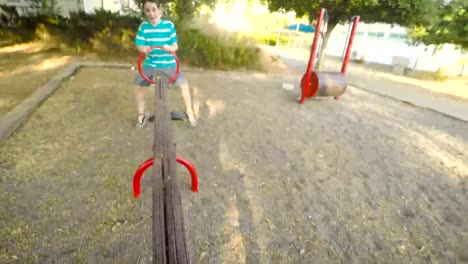 POV-footage-of-three-kids-playing-in-a-playground