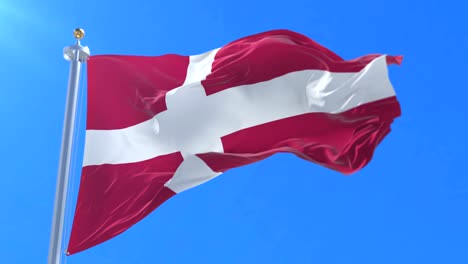 Denmark-flag-waving-at-wind-with-blue-sky,-loop