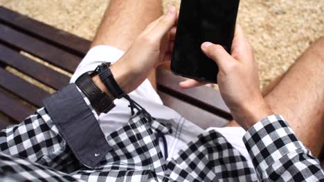 Personal-Perspective-of-a-Man-Sitting-in-a-Bench