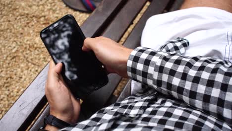 Personal-Perspective-of-a-Man-Sitting-in-a-Bench