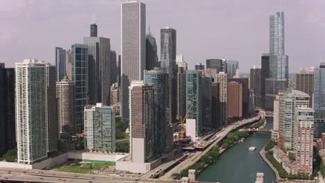 Aerial-approach-to-downtown-Chicago-from-Chicago-River.