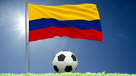 Rollos-de-bandera-de-Colombia-ondeando-y-una-pelota-de-fútbol-sobre-el-césped,-render-3d,-material-de-archivo-de-4-k