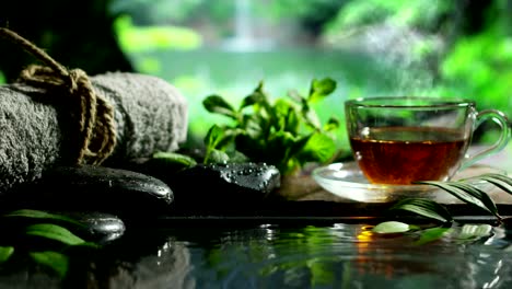 beautiful-water-and-candles-spa-and-wellness-composition-shoot-in-extreme-slow-motion.concept-of-relax-and-meditation.water