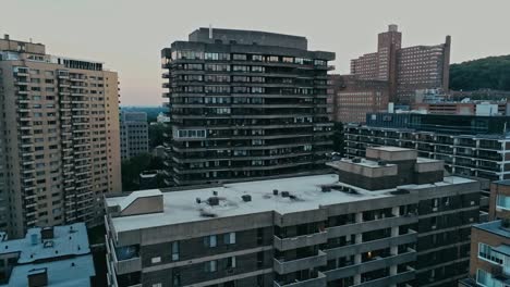 Aerial-footage-of-rundown-highrises-during-a-hazy-summer-day