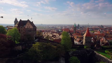 Aerial-city-with-a-castle-in-the-foreground-while-pointing-the-tower