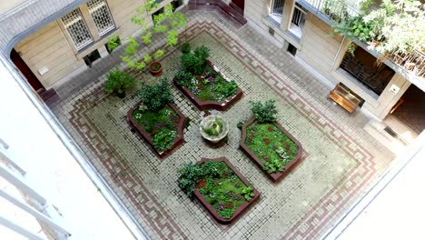 Court-yard-well.-A-beautiful-patio-inside-the-old-house-in-the-form-of-a-well.-Interior-of-yard-,-The-inner-courtyard-of-typical-hungarian-house