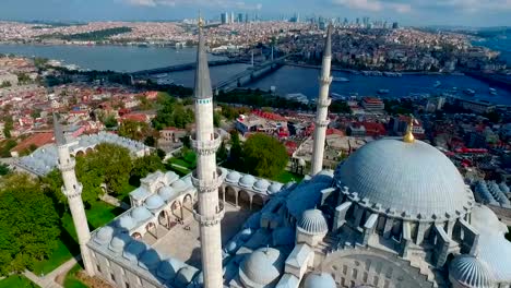 Mystique-Suleymaniye-Mosque-from-the-sky,-aerial-view-of-Istanbul-city,-Golden-Horn,-Turkey.