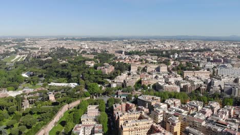 Aerial-Flying-a-drone-over-the-Colosseum-in-Rome,-Italy.-Coliseum-or-Flavian-Amphitheatre-or-Colosseo-oval-amphitheatre-centre.