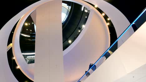 Building-atrium-with-escalator.-Abstract-shape-look.