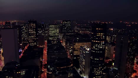 Flying-above-Rio-de-Janeiro-Downtown-at-Dusk,-Brazil