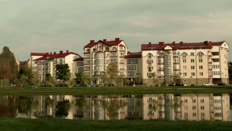 Hotel-on-the-river.-Autumn-daytime.-Smooth-dolly-shot.