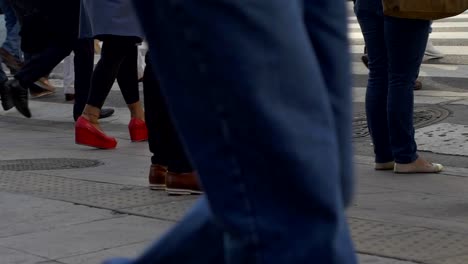 Feet-crossing-Florida-street-in-downtown-Buenos-Aires-in-slow-motion