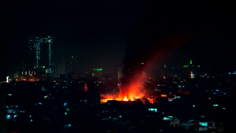 Big-fire-in-city-Jakarta,-burning-building.-FullHD-Timelapse---Jakarta,-Java,-Indonesia,