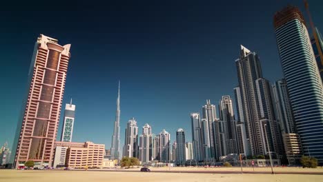 panorama-de-verano-dubai-ciudad-empresarial-Bahía-4-tiempo-k-lapso-Emiratos-Árabes-Unidos