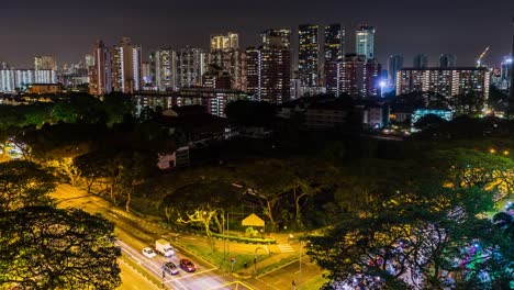 Vista-del-horizonte-de-centro-de-la-ciudad-de-Singapur,-lapso-de-tiempo-de-escena-de-noche-de