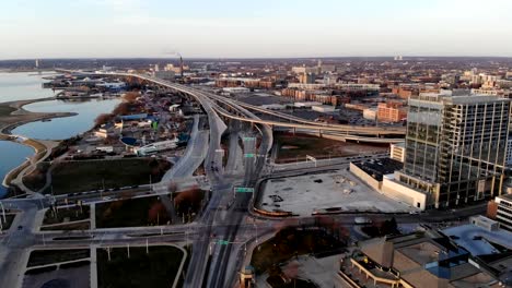 Aerial-view-of-american-city-at-dawn.-High-rise--buildings,-freeway,-bay.--Sunny-morning.-Milwaukee,-Wisconsin,-USA