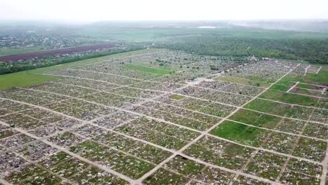 An-aerial-over-a-vast-cemetery-of-headstones-honors-veterans