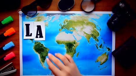 Las-Vegas-city-word-letters-world-map-inscription-wooden-table.-The-concept-of-geography-vacations-travel-trip-adventures