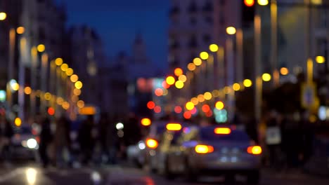 Defocused-city-pedestrian-traffic-on-a-busy-street/-Gran-Via/-in-central-Madrid