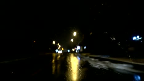 Timelapse-Dark-Dash-Camera-Car-Scene-on-a-Rainy-Night