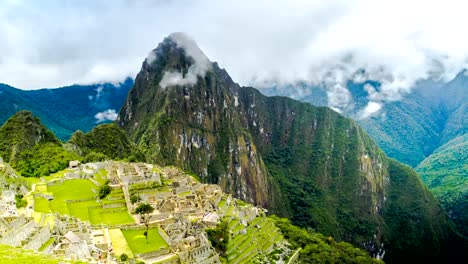 Time-lapse-of-tourists-in-Machu-Picchu-and-the-clouds-at-the-mountain