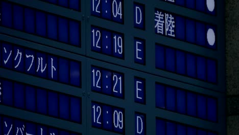 On-electronic-scoreboard-in-Seoul,-South-Korea-at-airport-showing-departure-times