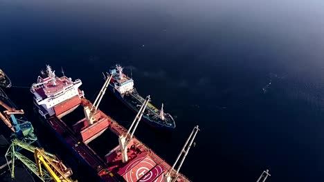 Cargo-Ship-in-the-Port-and-Tanker-Above-view-from-Drone