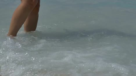 Girl-Feet-Splashed-by-Waves