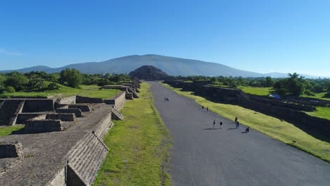 Aerial-view-of-pyramids-in-ancient-mesoamerican-city-of-Teotihuacan,-Pyramid-of-the-Moon,-Valley-of-Mexico-from-above,-Central-America,-4k-UHD