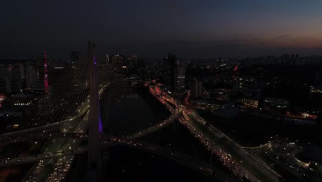 Aerial-View-of-Marginal-Pinheiros-and-Estaiada-Bridge-at-night-in-Sao-Paulo,-Brazil