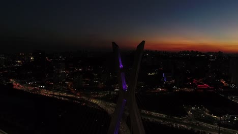 Aerial-View-of-Marginal-Pinheiros-and-Estaiada-Bridge-at-night-in-Sao-Paulo,-Brazil