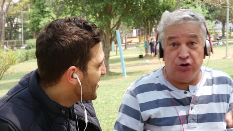 Father-and-Son-listening-music-and-having-fun