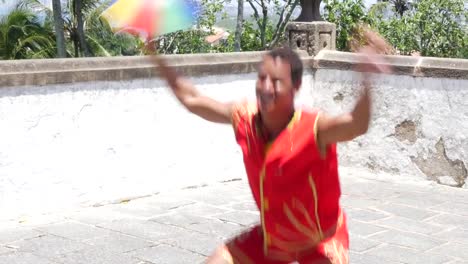 Brazilian-guy-dancing-Frevo-in-Olinda,-Brazil