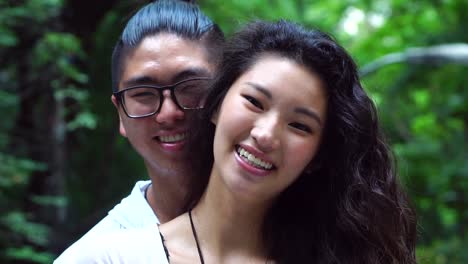 Portrait-of-Asian-Couple-Smiling