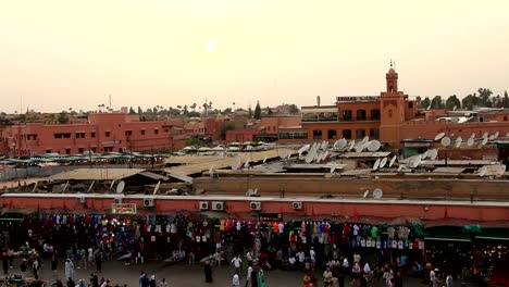 Crowds-of-pedestrians-walking-in-old-town-Medina-in-Marrakesh,-Morocco.