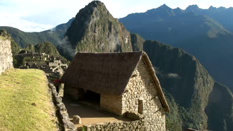 high-angle-view-of-a-restored-hut-at-machu-picchu-on-a-sunny-morning