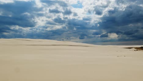 Timelapse-of-Sandy-Desert-and-Dark-Storm-Clouds