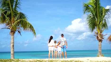 Parents-with-two-kids-enjoy-their-caribbean-vacation-on-Antigua-island