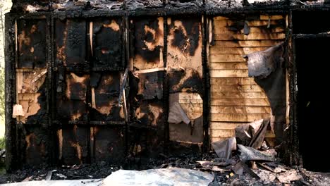 Burned-down-private-wooden-house.