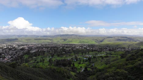 STP7_Starting-far-out-above-hill-going-backwards-toward-a-hill-during-a-sunny-day.