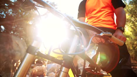 Two-mountain-biker-fist-bumping