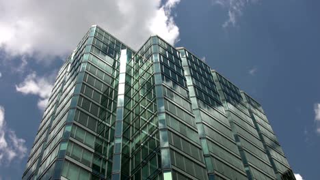 Blue-green-office-tower.-Timelapse-shot.