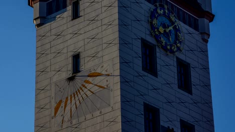 Sundial-and-clock-tower-showing-daylight-savings-time-lapse