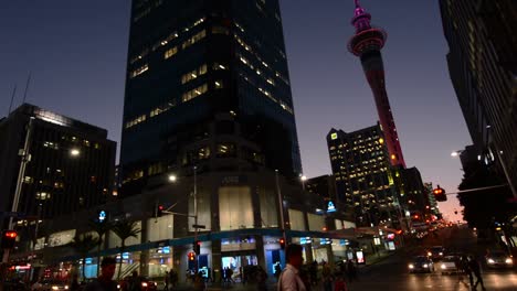 Tilt-down---Traffic-on-Queen-Street-in-Auckland-New-Zealand